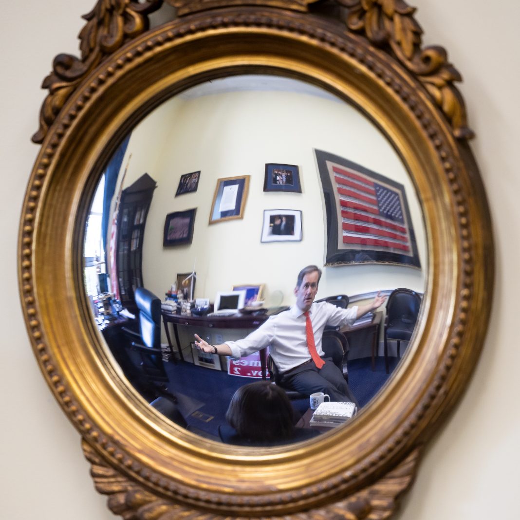 Himes is reflected in a mirror during an POLITICO in his office on Capitol Hill in Washington, on April 23, 2026.