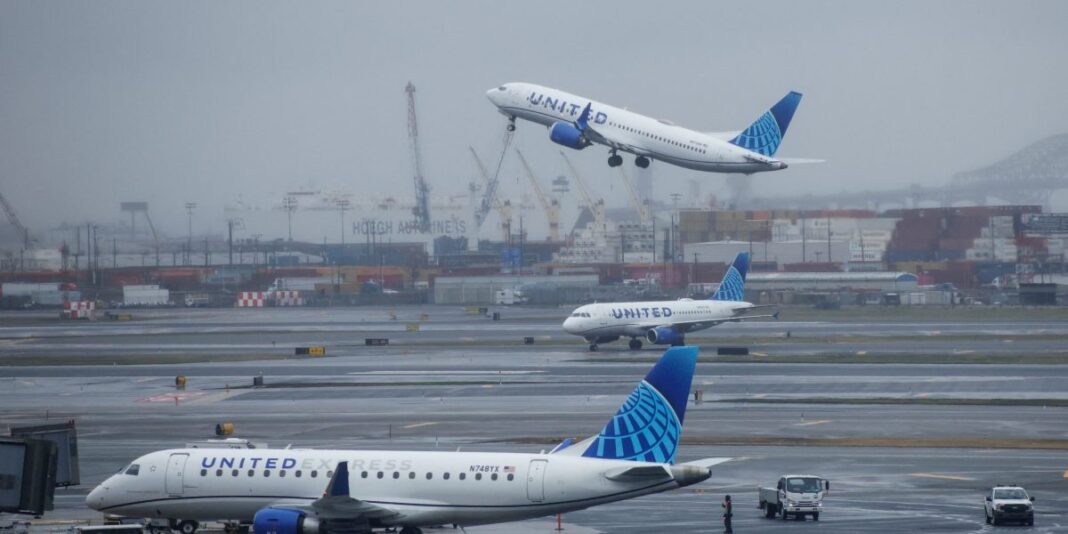 A United Airlines plane hits a truck and light pole while landing at Newark airport