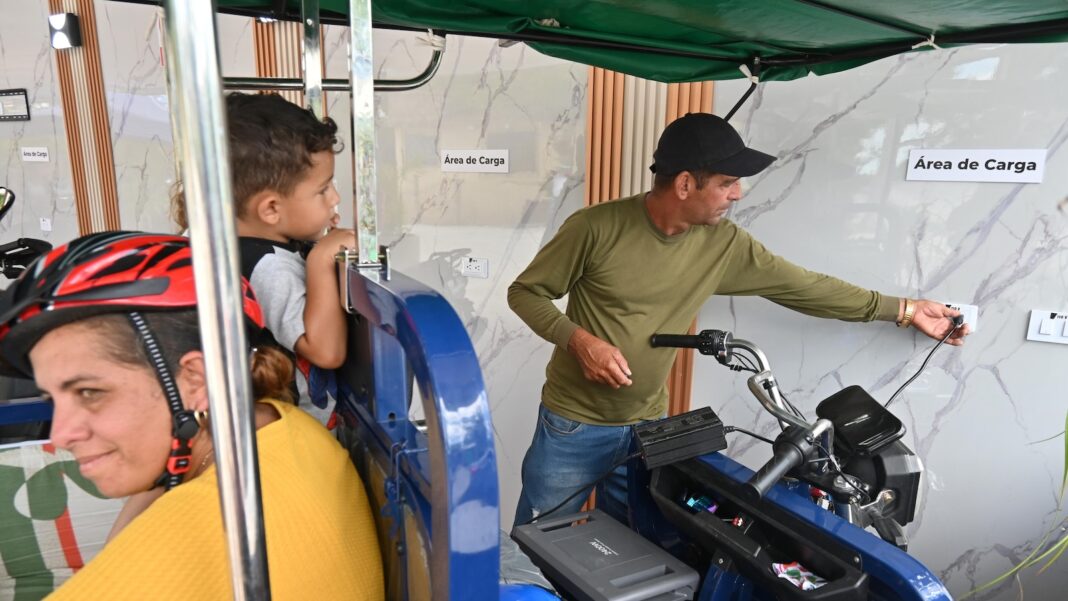 A solar-powered charging station in central Cuba brings life to a darkened island