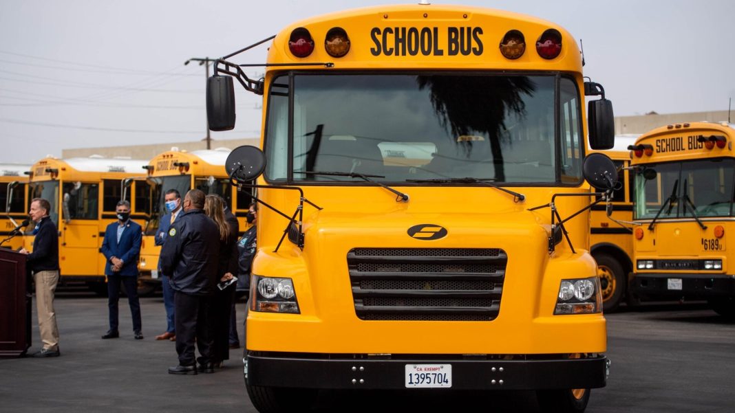 In front of a LAUSD electric school bus