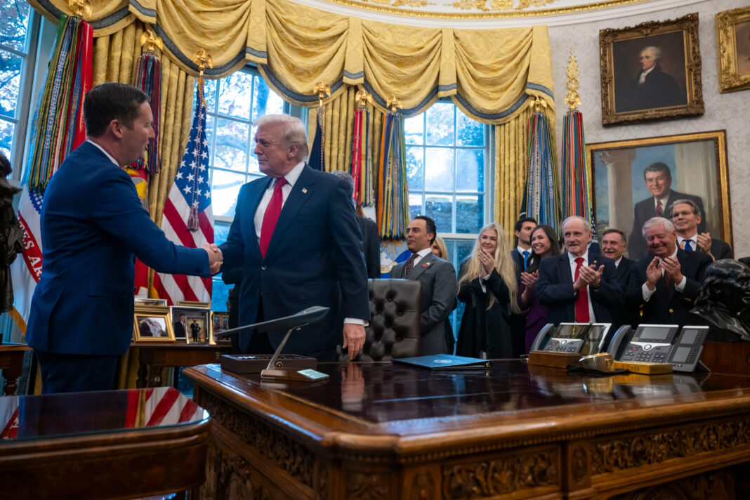 Gor shakes hands with President Donald Trump after being sworn in as U.S. Ambassador to India by Vice President JD Vance in the Oval Office at the White House in Washington, on Nov. 10, 2025.