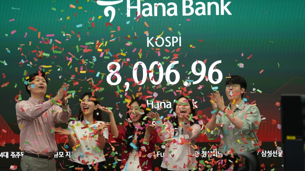 World shares are lower after South Korea's Kospi hits records, as Trump wraps up Beijing trip